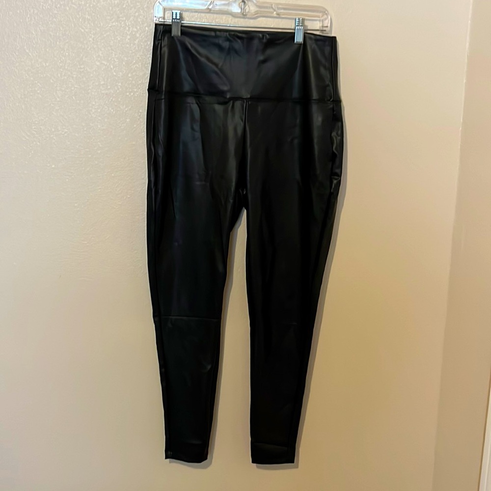 Faux black leather leggings.